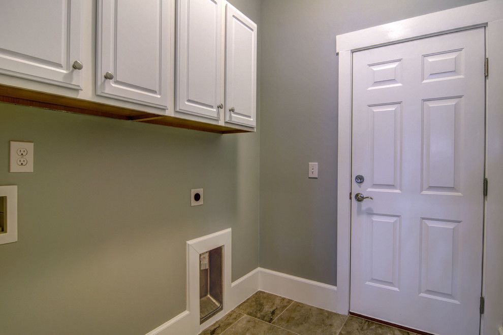 Helm Paint for a Beach Style Laundry Room with a Beach Style and Heron Ii Model in Helms Port by Logan Homes