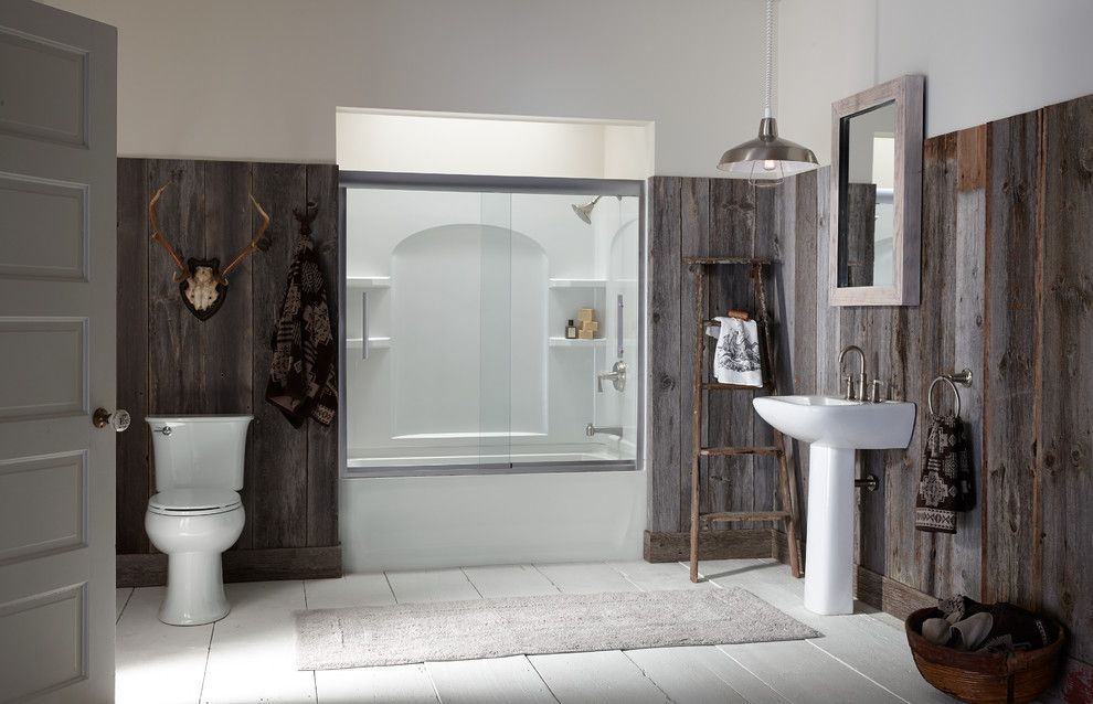 How Much Does a Spray Tan Cost for a Rustic Bathroom with a Reclaimed Wood Walls and Bathroom by Sterling Plumbing