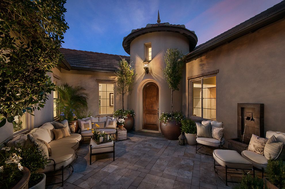 Lazar Furniture for a Mediterranean Patio with a Finial and Camelot Reserve by Camelot Homes