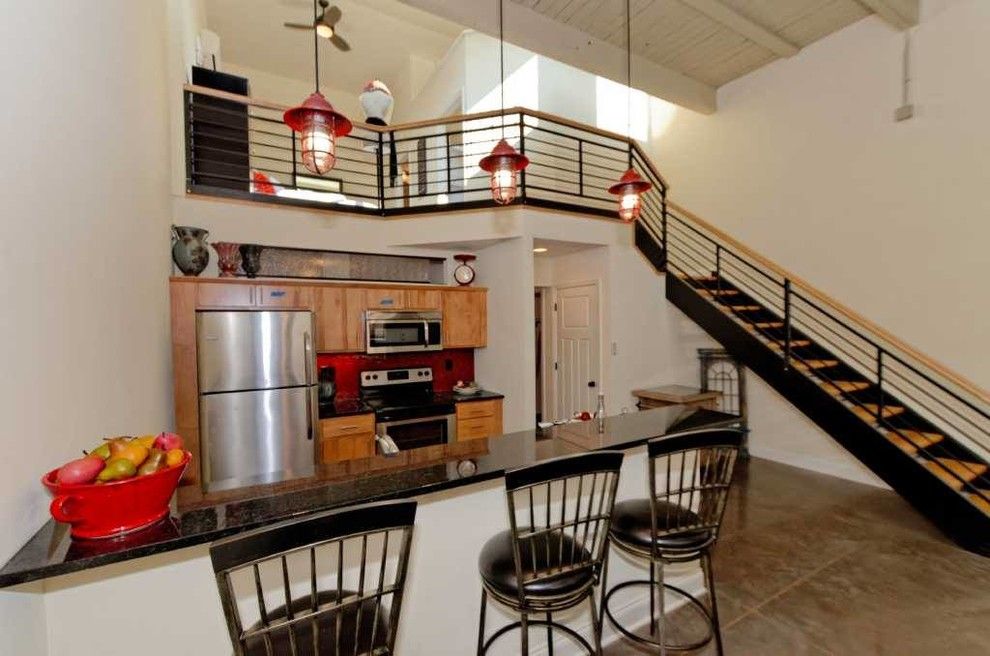 Long Island Paneling for a Industrial Kitchen with a Industrial Living Room and Window Factory Lofts by Viscusi Builders Ltd.