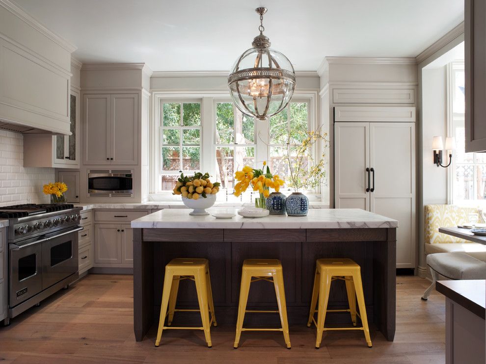 Long Island Paneling for a Traditional Kitchen with a Tolix Bar Stool and Mill Valley Classic Cottage by Heydt Designs