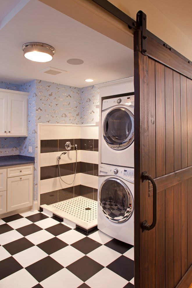 Midwest Homes for Pets for a Traditional Laundry Room with a Stacked Washer and Dryer and Classic Lake Cottage with a Modern Twist by Ridge Creek Custom Homes