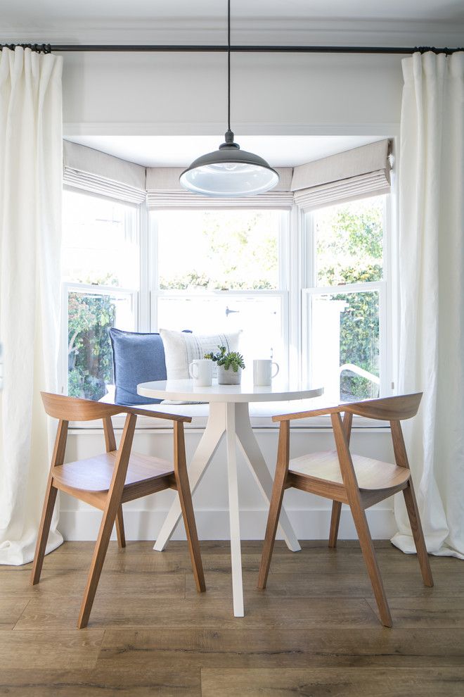 Nook Bistro for a Farmhouse Dining Room with a Mid Century Modern Chairs and Modern Farmhouse by Lindye Galloway Design