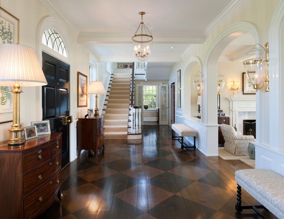 Ohio Valley Flooring for a Traditional Entry with a Sideboard and Radnor House by E. B. Mahoney Builders, Inc.