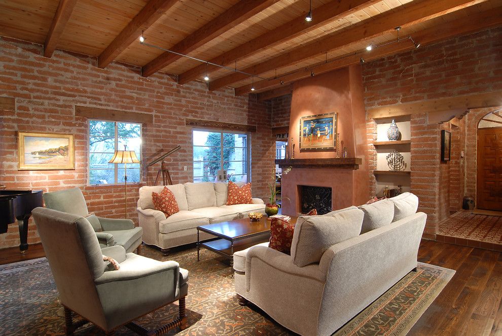 Potomac Valley Brick for a Southwestern Living Room with a Dark Wood Floor and Historic Adobe by Lisa Gildar Interior Spaces