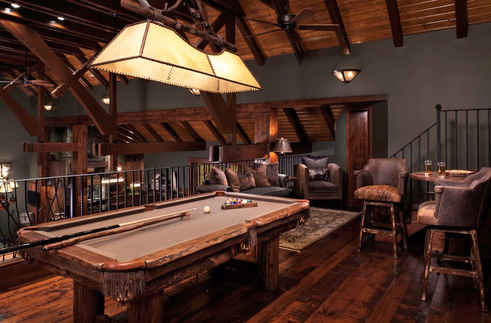 Rawhide Ranch for a Rustic Family Room with a Billiard Table and Rustic Family Room by Denisestringerinteriordesign.com