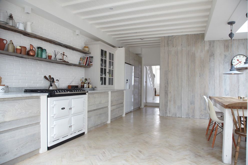 Restaining Wood for a Scandinavian Kitchen with a Brick Wall and Scandinavian Renovation by Blakes London