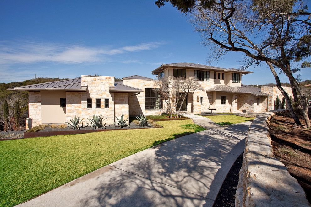 Roof Pitches for a Contemporary Exterior with a Entry and Barton Creek Residence Front Exterior by Cornerstone Architects