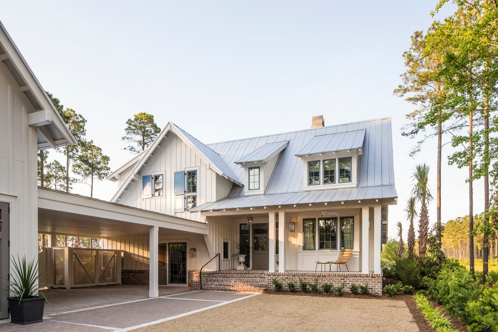 Roof Pitches for a Farmhouse Exterior with a Blue Shutters and Southern Living Photos by Southern Living