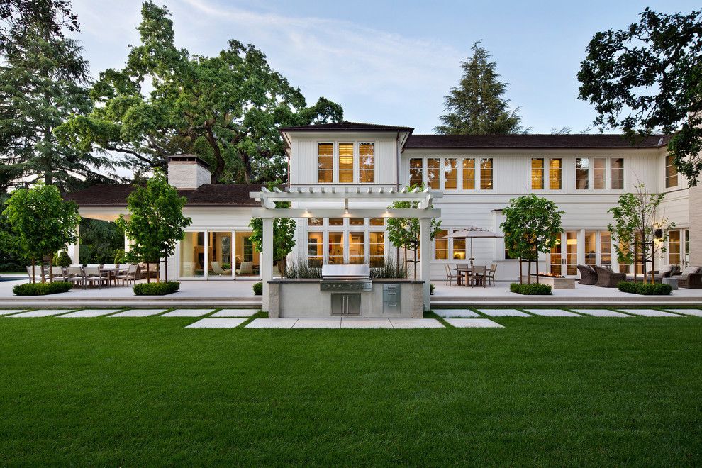 Roof Pitches for a Transitional Exterior with a Backyard and Almendral by Sdg Architecture, Inc.