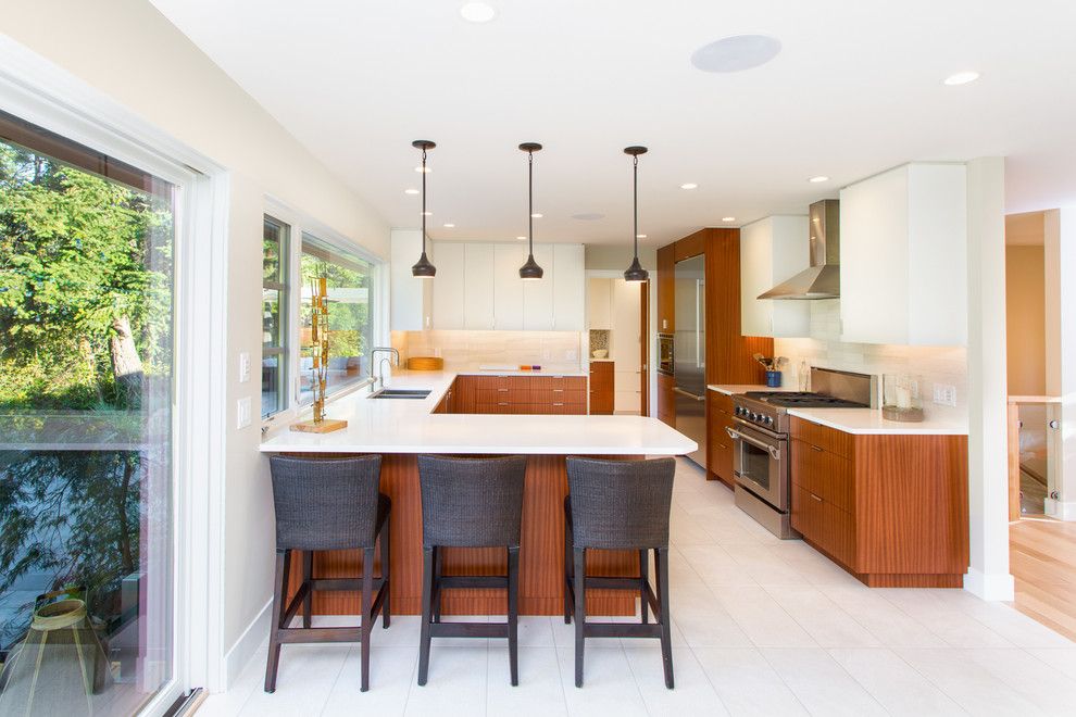 Sapele Wood for a Contemporary Kitchen with a Beige Backsplash and Hall Renovation by Cindy Ross Interior Design