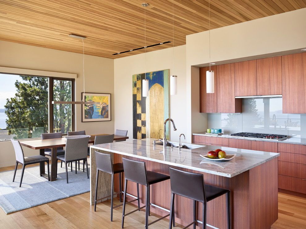 Sapele Wood for a Contemporary Kitchen with a Gray Dining Chairs and Gallery House by Deforest Architects