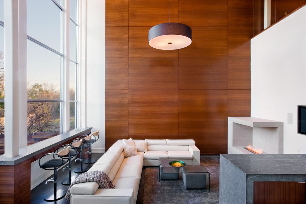 Sapele Wood for a Contemporary Living Room with a Built in and Contemporary Living Room by Dick Clark + Associates