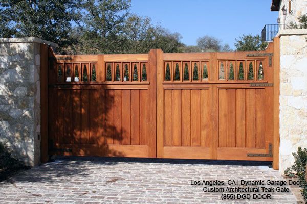 Schwing Electric for a Eclectic Exterior with a Garden Gates and Custom Designed Solid Teak Automatic Driveway Swing Gates by Dynamic Garage Door