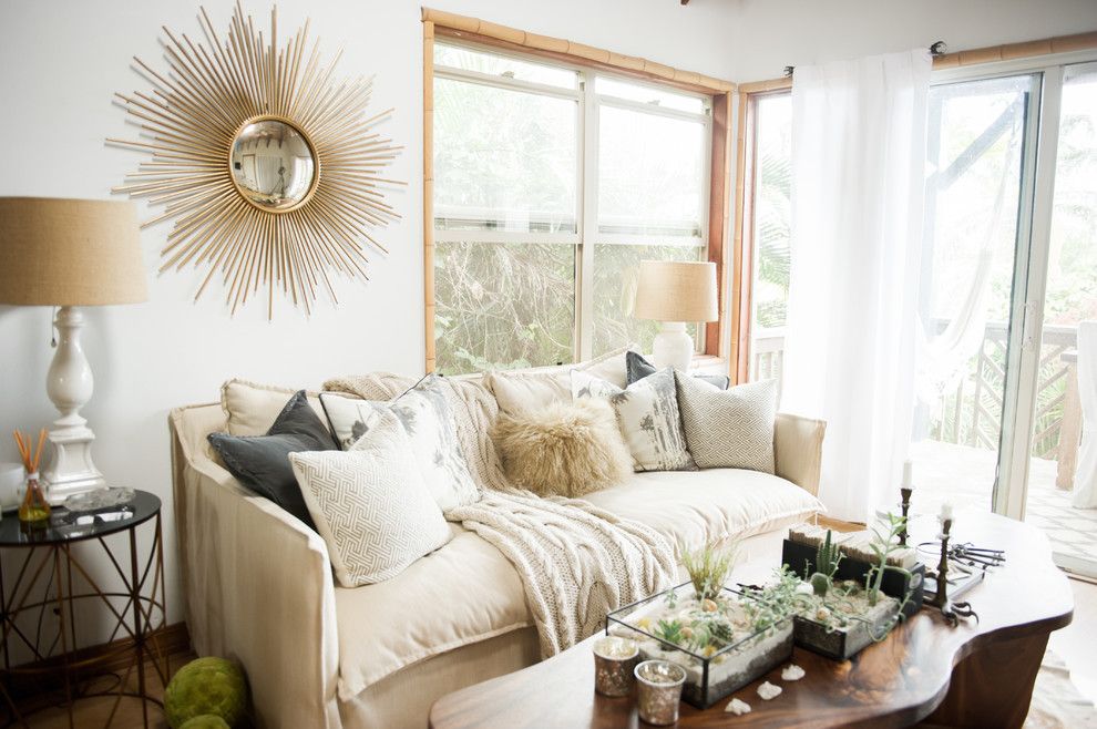 Sport Chalet La Canada for a Beach Style Living Room with a Round Mirror and My Houzz: Chic Boho Style for a Hawaii Apartment by Ashley Camper Photography