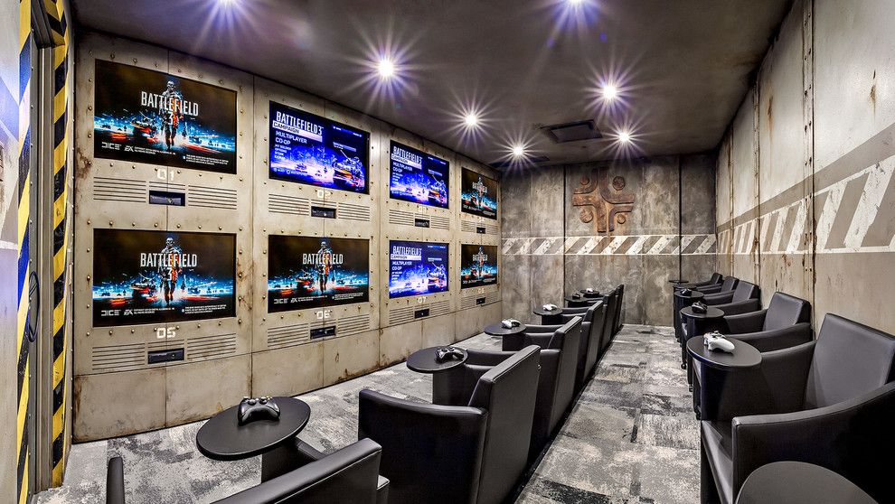 Stadium Lofts Anaheim for a Industrial Home Theater with a Recessed Lighting and Gaming Room by K&w Audio