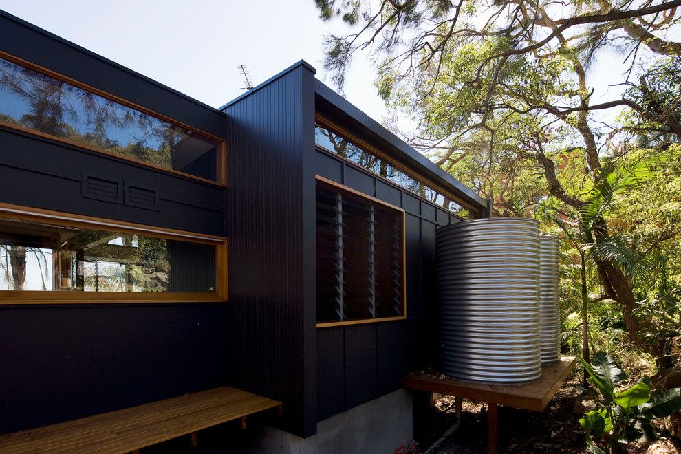 Tankless vs Tank Water Heater for a Contemporary Exterior with a Sydney and Ozone House by Matt  Elkan Architect