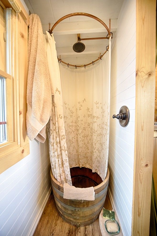 Tankless vs Tank Water Heater for a Rustic Bathroom with a Paneled Walls and Our Tiny Tack House by the Tiny Tack House