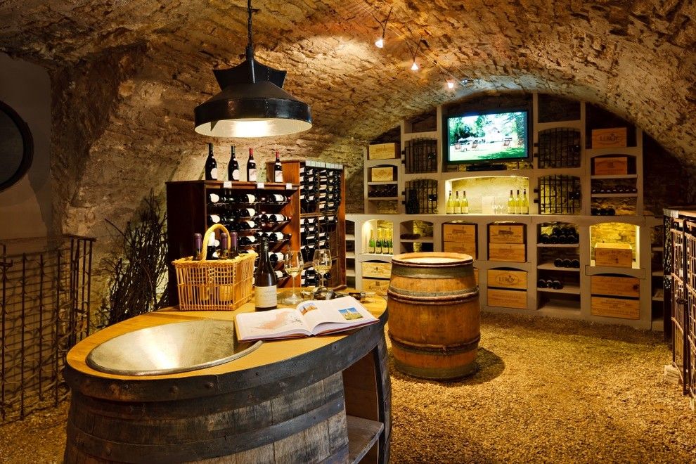 Wine Cellar Los Gatos for a Rustic Wine Cellar with a Barrel Vault Ceiling and Wine Cellar of Burgundy Limestone by Vinis Bmc Production