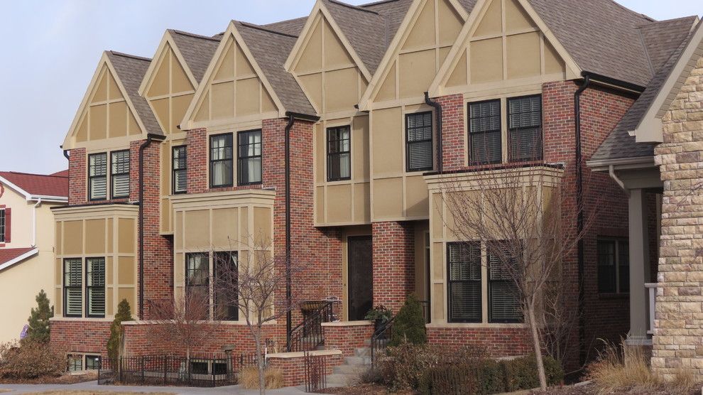 Ymca Lincoln Ne for a Traditional Exterior with a Attached Housing and Tudor Row Houses in Village Gardens, Lincoln, Ne. New Urbanism Neighborhood by Peace Studio Architects, Inc.