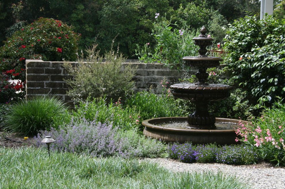 2700k Light for a Mediterranean Landscape with a Fountain and 1900 Farm House by Pat Brodie Landscape Design