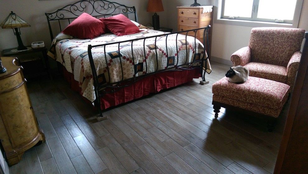 Abbey Flooring for a Traditional Bedroom with a Gray Hardwood and Bedrooms by Seland's Abbey Flooring Center