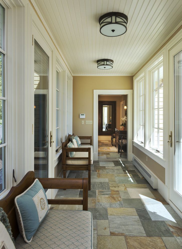 Abbey Flooring for a Traditional Entry with a Stone Tile Floor and Traditional Entry by Whittenarchitects.com