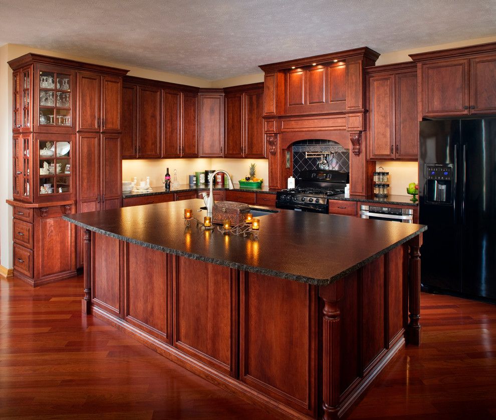 Adorne for a Traditional Kitchen with a Cherry and Adorned Traditional Cherry by Cabinet Factory Outlet Plus