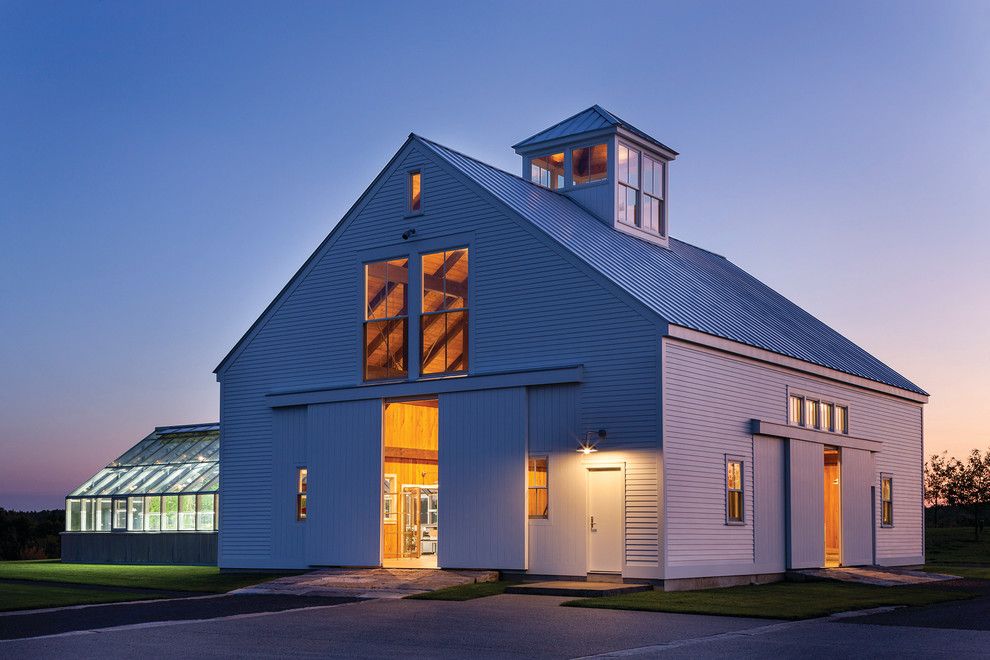 Aia Houston for a Farmhouse Exterior with a Sliding Barn Doors and Berkshire Farmhouse by Marvin Windows and Doors