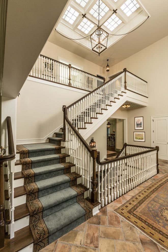 Airbase Carpet Mart for a Traditional Staircase with a Pendant Light and M Magazine by Edmunds Studios Photography, Inc.