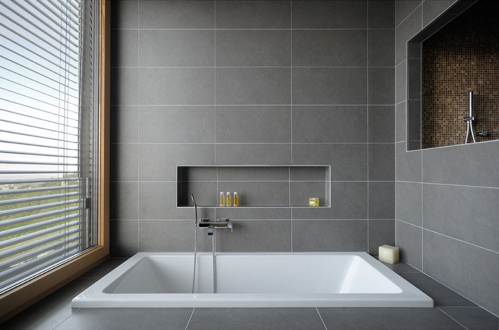 Alcove Definition for a Contemporary Bathroom with a Large Window and Casa Magnanelli by Manuel Benedikter Architetto