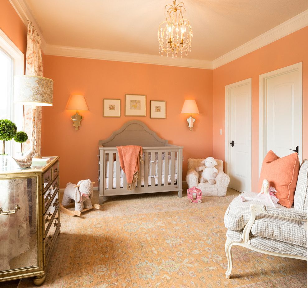 Alexa Hampton for a Traditional Nursery with a White Crown Molding and Children's Bedrooms by Mccroskey Interiors