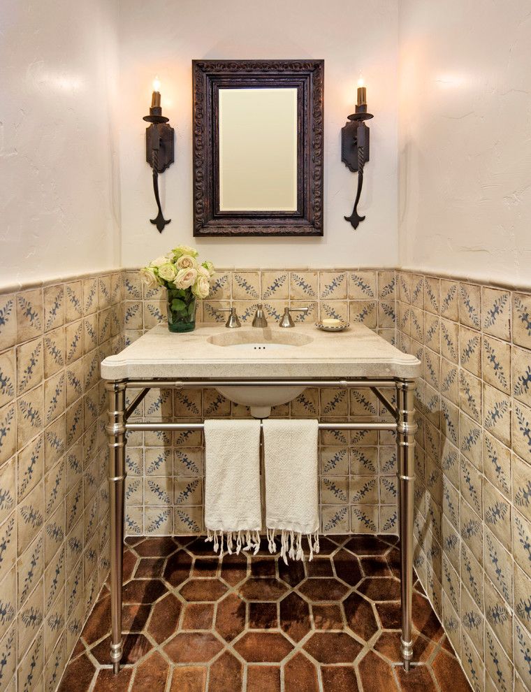 Alltex for a Mediterranean Powder Room with a Framed Mirror and Historic Ranch House Renovation by Allen Construction