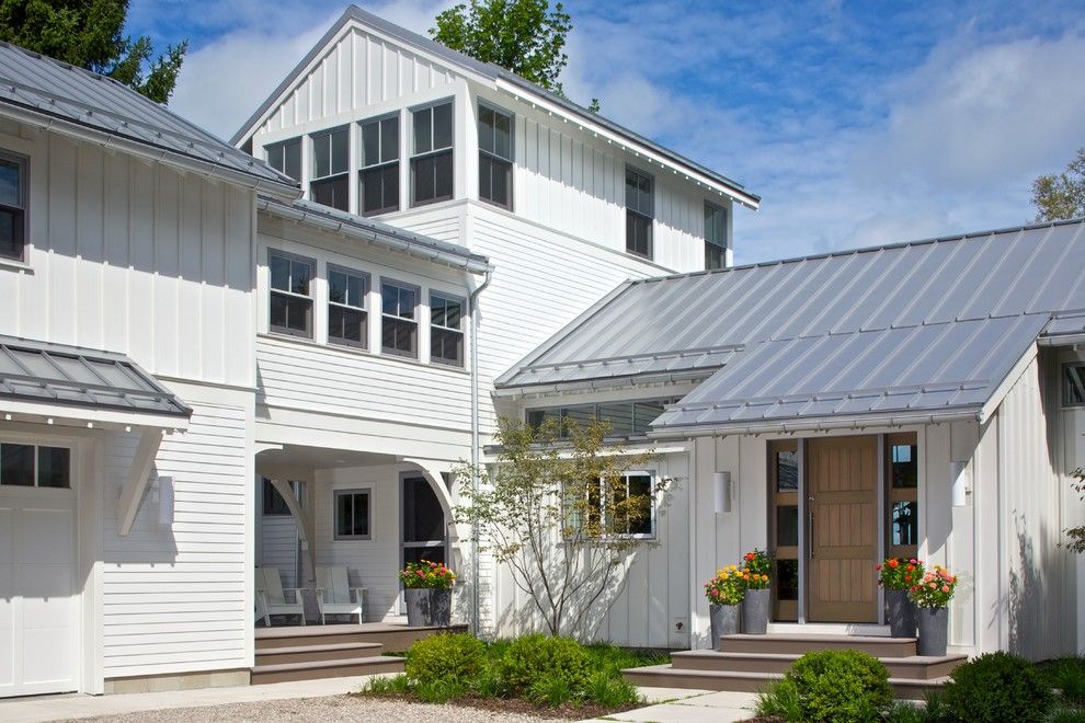 Alpine Snow Guards for a Traditional Exterior with a Clerestory Windows and Northern Michigan Treasure by Scott Christopher Homes