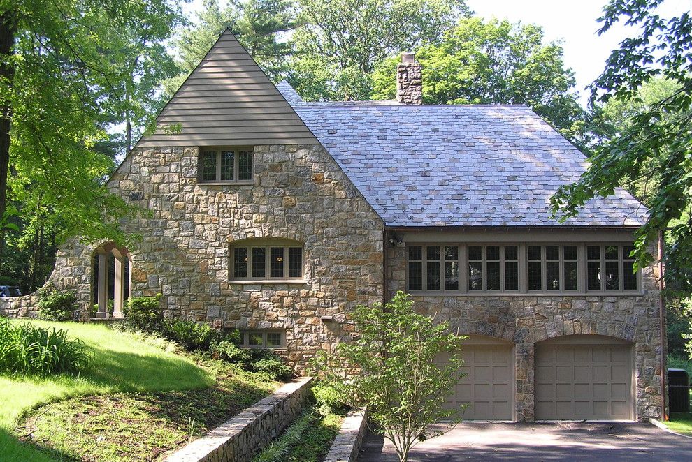 Alpine Snow Guards for a Traditional Exterior with a Cross Gable Roof and Stone Manor House in Scarsdale, Ny by Hamlin Goldreyer Architects