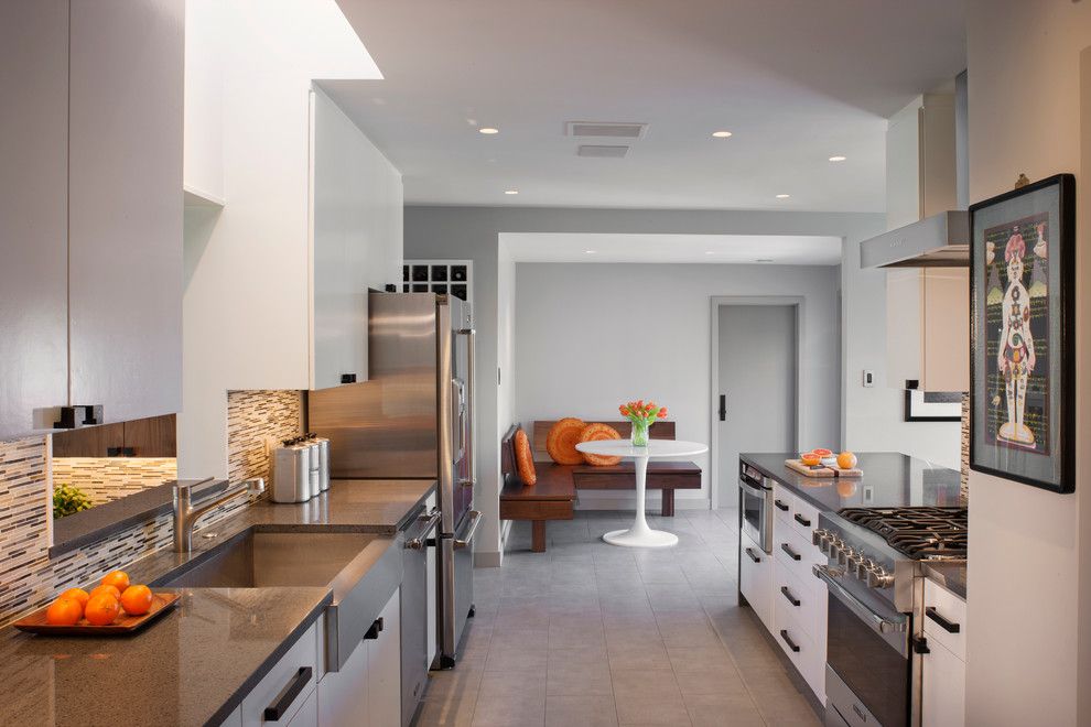 Amaron for a Transitional Kitchen with a Stainless Steel Appliances and Balcones Modern Residence   After by Steinbomer, Bramwell & Vrazel Architects