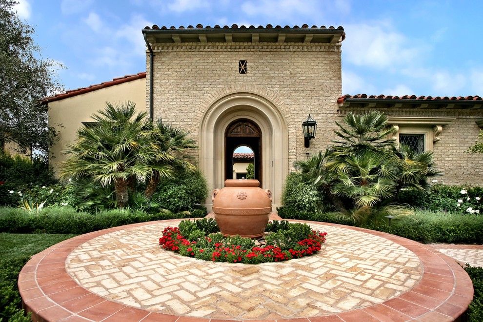 Amli South Shore for a Mediterranean Landscape with a Brick and Ams Landscape Design Studios by Ams Landscape Design Studios, Inc.