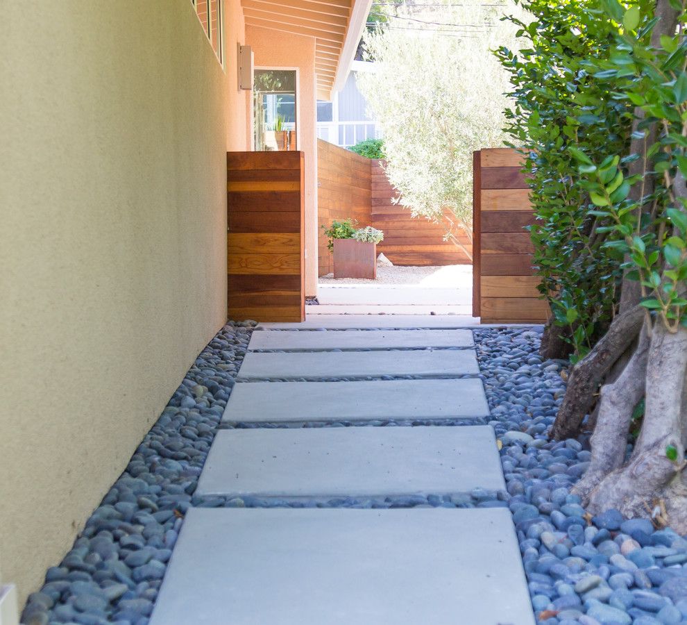 Angelus Block for a Contemporary Landscape with a Pipe Wood Deck and Modern Minimalist by Dp Environments