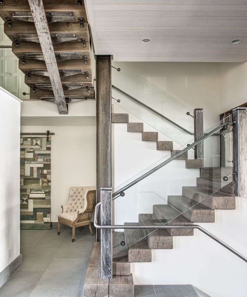 Anixter Center for a Contemporary Staircase with a Landing and Custom River House by Selle Valley Construction, Inc.