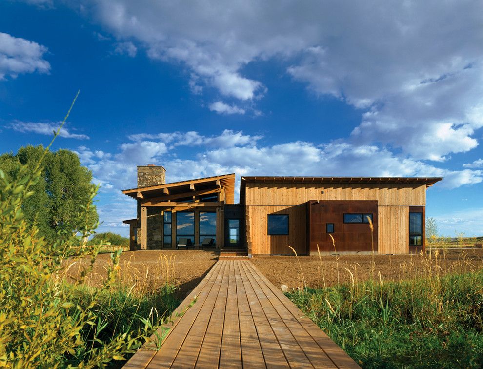 Appalachian Log Homes for a Rustic Exterior with a Glass Doors and New Fork Social Club by Carney Logan Burke Architects