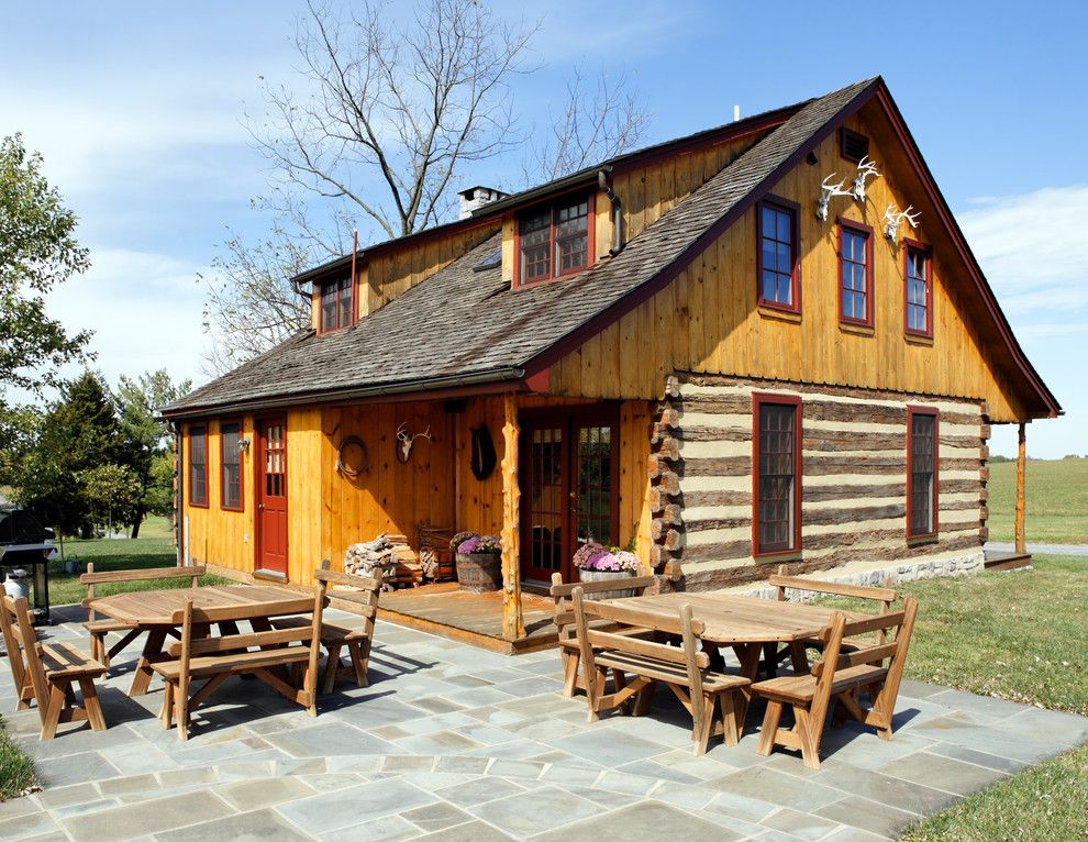 Appalachian Log Homes for a Rustic Exterior with a Meadow and Front by Kohlmark Architects and Builders