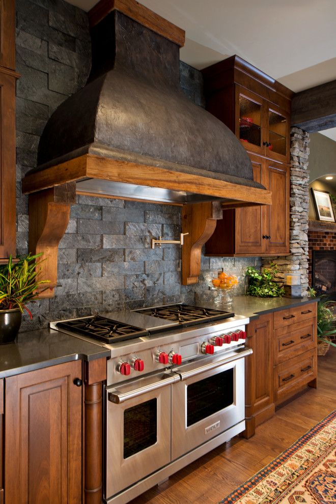 Appalachian Log Homes for a Rustic Kitchen with a Heartwood Maple and 2014 Parade of Homes   Pinnacle Home Winner – Best Kitchen by Columbia Cabinets