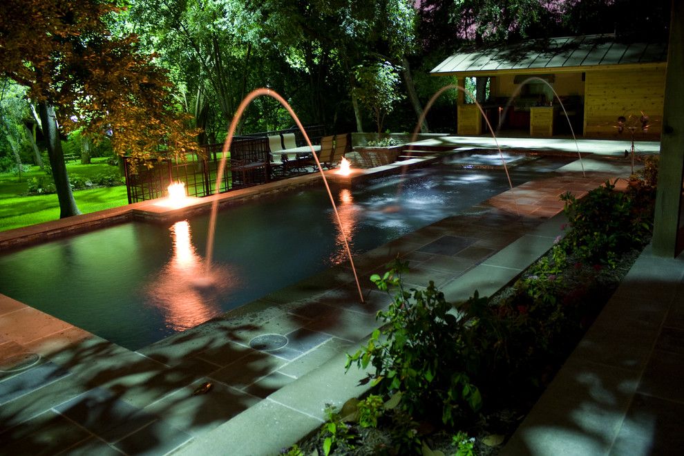 Aquaterra for a Eclectic Pool with a Firepit and Fire Features by Aquaterra Outdoors