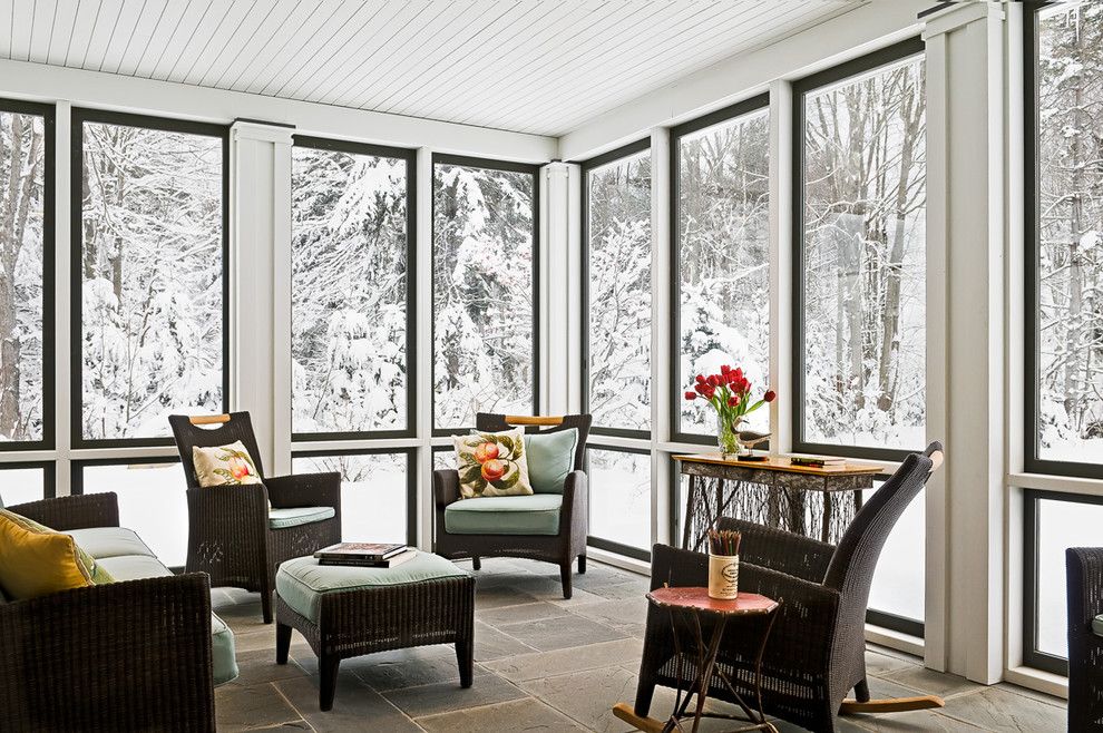 Armstrong Commercial Flooring for a Farmhouse Porch with a Patio Furniture and Sun Room in Winter by Whitten Architects