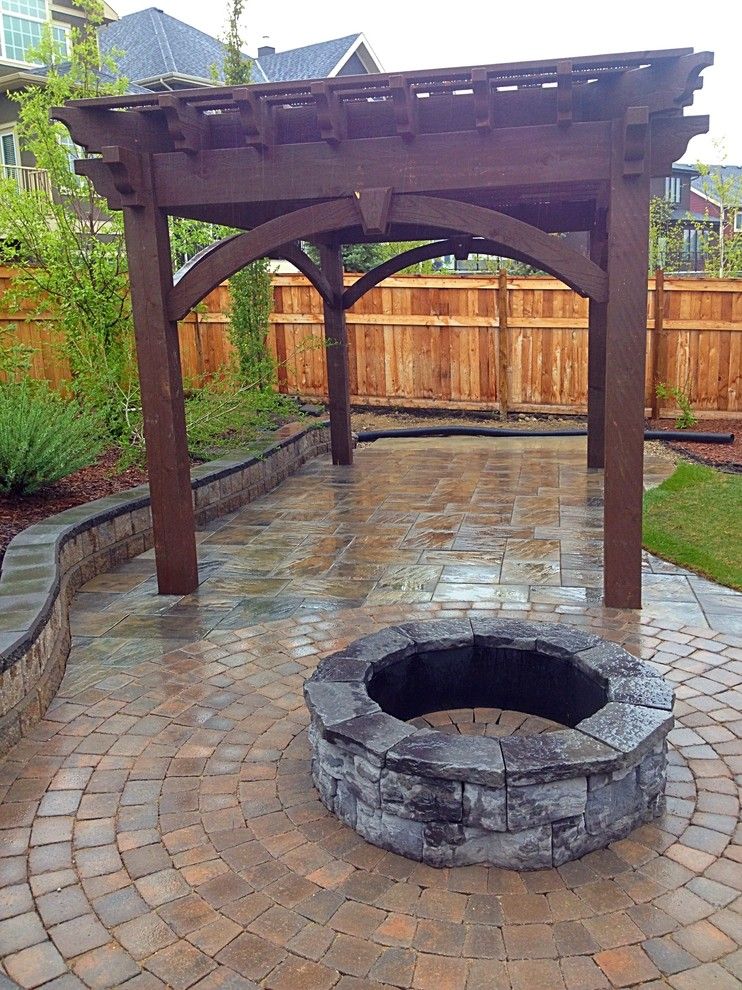 Aspen Contracting for a Traditional Landscape with a Covered Patio and Pergolas by Blue Aspen Contracting