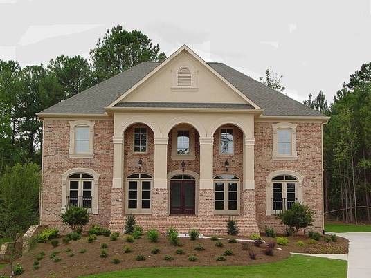 Atlanta Homes and Lifestyles for a Traditional Exterior with a Traditional and Ahb Custom Home Builders   Royal Lake Estates Residence by Ahb General Contractors