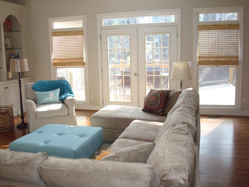 Atlanta Homes and Lifestyles for a Traditional Family Room with a Blue Ottoman and the Q Home by Rachel Greathouse