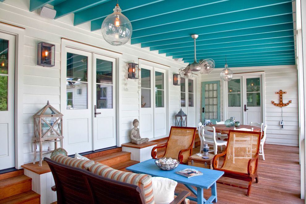 Atlas Roofing For A Beach Style Porch With A Ceiling Fan And