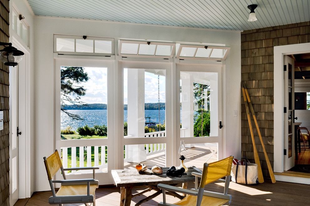 Atrium Windows and Doors for a Beach Style Porch with a Wood Ceiling and Three Season Porch by Whitten Architects