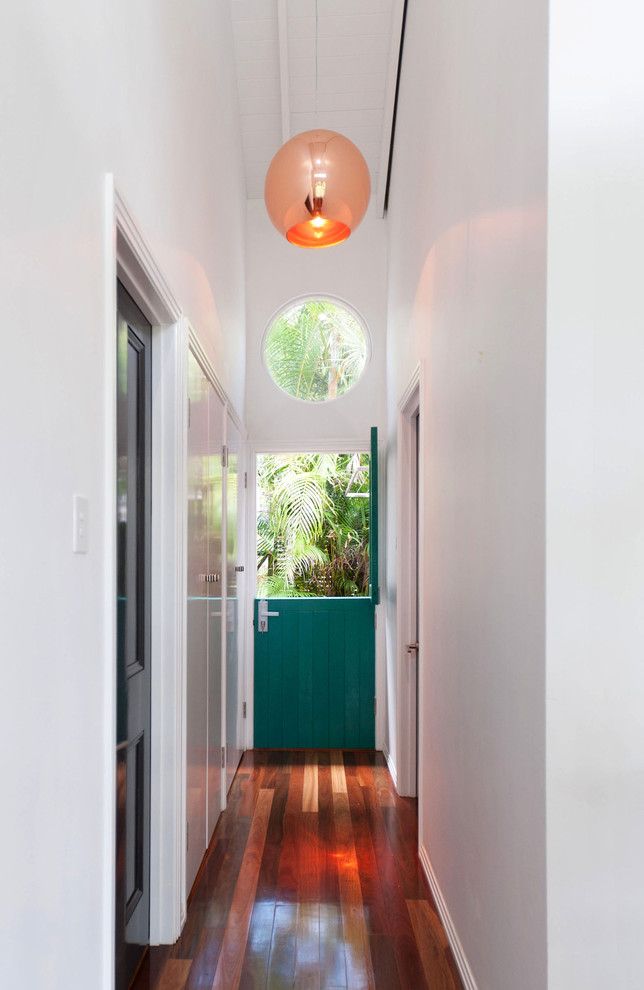 Atrium Windows and Doors for a Contemporary Hall with a Aqua Paint Colour and Hallway Detail by Skyring Architects